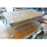 A rectangular Continental hinged walnut and wrought iron coffee table, width 132cm, depth 71cm,