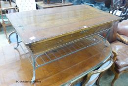 A rectangular Continental hinged walnut and wrought iron coffee table, width 132cm, depth 71cm,