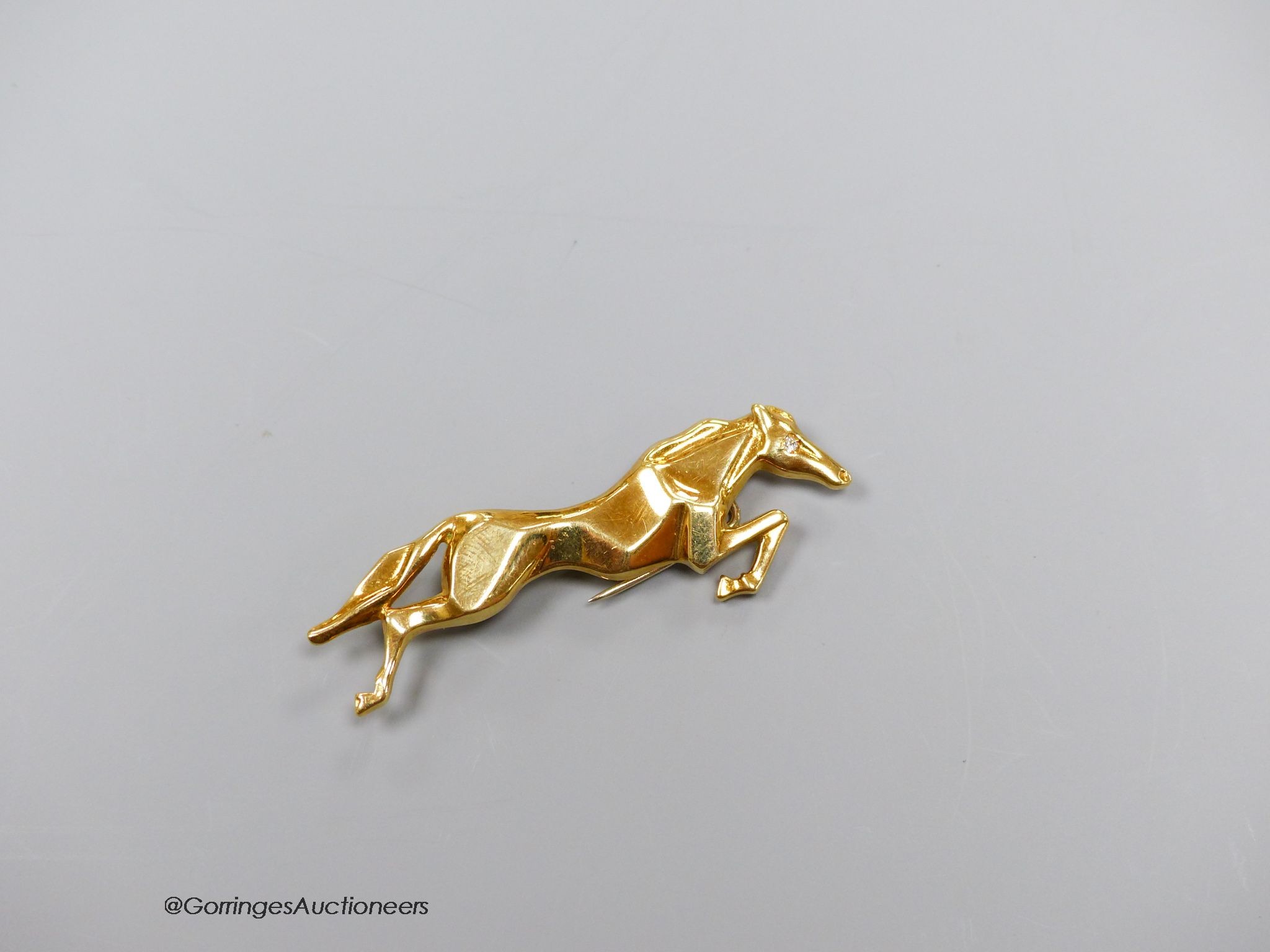 An 18k gold (750) diamond set horse brooch, gross 6.3g, 5cm. - Image 2 of 3