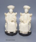 A pair of mid 20th century Chinese faux ivory figures of an Emperor and Empress, height 31cm