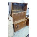 A mid century design Vanson teak fall front cabinet, width 70cm, depth 39cm, height 138cm