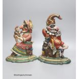 A pair of painted cast iron Punch and Judy door stops, height 30cm