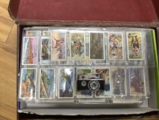 Smoking items including a Japanese camera lighter and cigarette cards