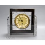 A stepped grey marble/slate mantle clock