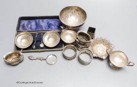 A pair of silver salts (cased), another pair of footed salts, a bowl, two napkin rings, etc.