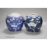 Two early 20th century Chinese blue and white prunus jars, tallest 16cm