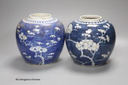 Two early 20th century Chinese blue and white prunus jars, tallest 16cm