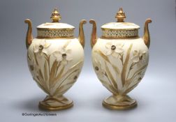 A pair of Grainger & Co. Worcester Royal China Works porcelain pot pourri vases and covers, height
