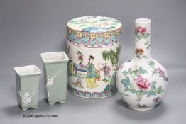 A Chinese famille rose bottle vase and a similar jar and cover and two celadon glazed vases,