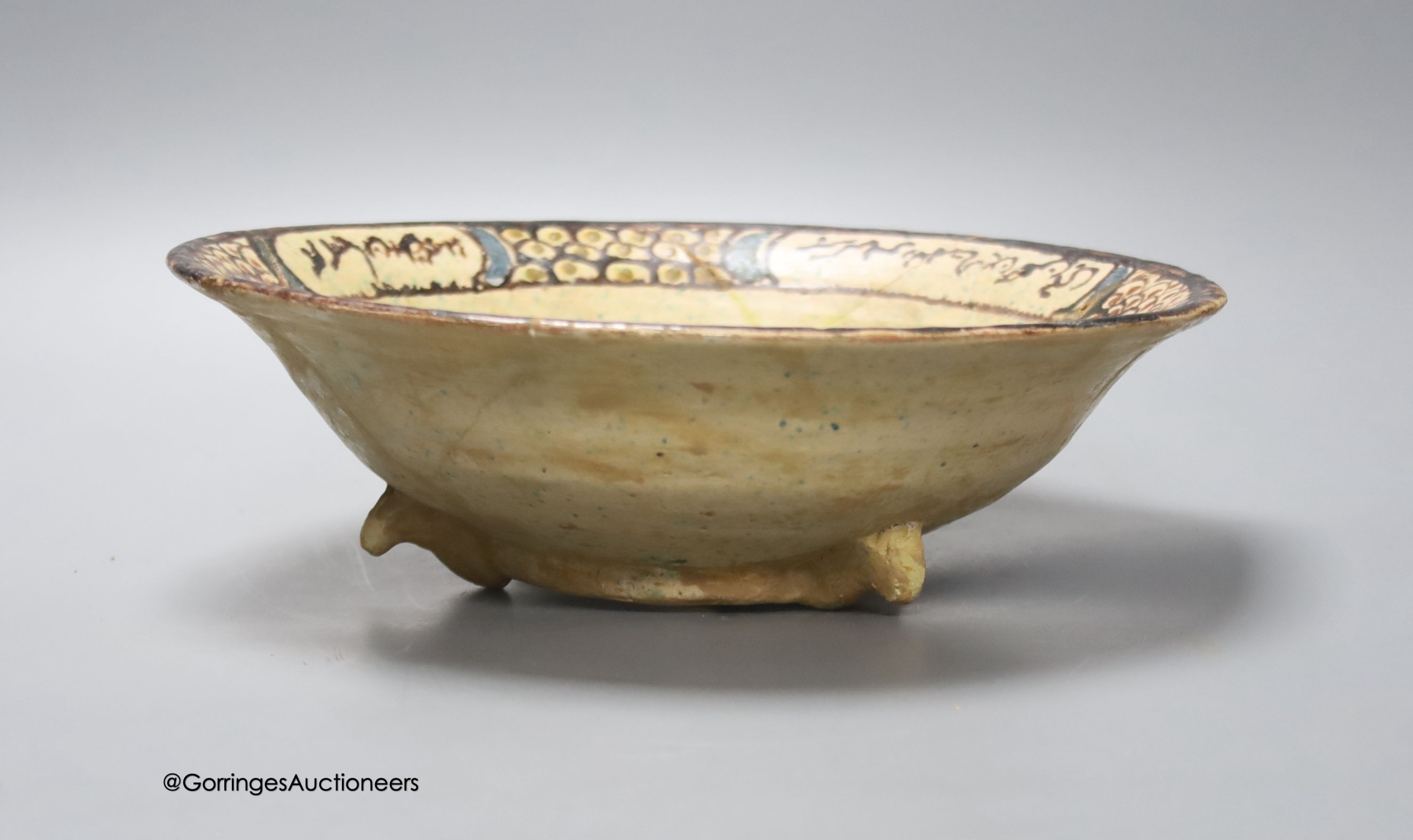 An Islamic bowl with central figure and scripted border, diameter 26cm (a.f.) - Image 2 of 2