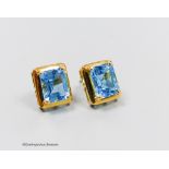 A pair of 18ct gold and topaz earrings, gross 4g.