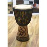 A Ghanian Djembe drum, height 62cm