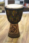 A Ghanian Djembe drum, height 62cm