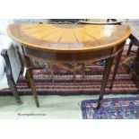 A reproduction Sheraton style inlaid satinwood D shaped consul table, length 114cm, depth 49cm,