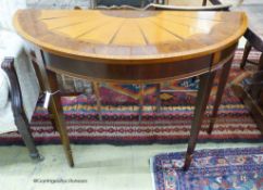 A reproduction Sheraton style inlaid satinwood D shaped consul table, length 114cm, depth 49cm,