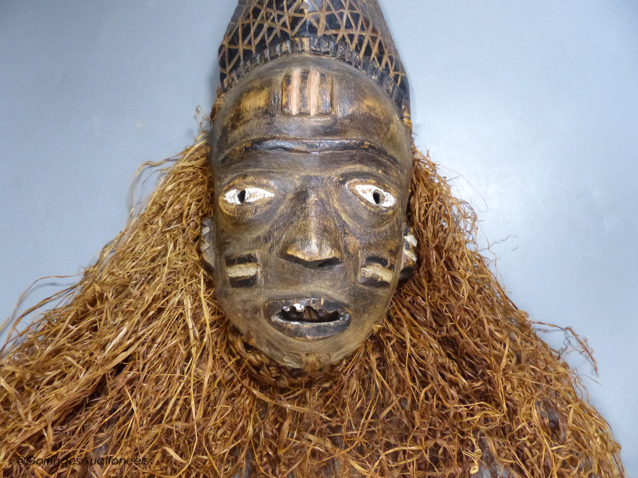 A Bapende tribal carved wood mask, 41cm high - Image 2 of 3