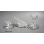 Two Lalique ashtrays mounted with birds, etched signatures to bases, and a Lalique style frosted