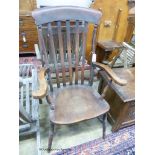 A 19th century beech and elm lathe back Windsor armchair