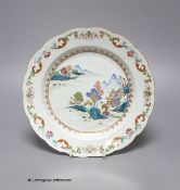 A Chinese Export famille rose plate, Qianlong period,with waved edge, polychrome-decorated with a