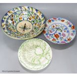 A Moroccan terracotta dish, an Ironstone dish, a green and white leaf dish, largest 30cm