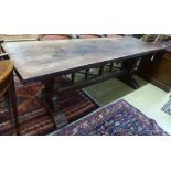 An 18th century style rectangular oak refectory dining table, length 239cm, width 77cm, height 81cm