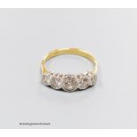 An 18ct gold five stone diamond ring, size T, gross 4.3g.Approx. 1.30ct.