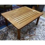 A teak low garden table, width 90cm, depth 70cm, height 42cm