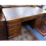 A George III style mahogany pedestal desk, length 152cm, depth 90cm, height 74cm