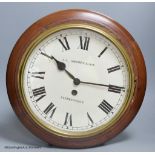 An early 20th century mahogany cased wall clock, A.A. Osborne & Son, diameter 40cm, American