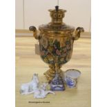 A Russian gilt samovar painted with flowers and a small collection of Russian ceramics,including a