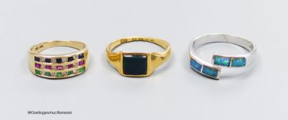 An 18ct white gold and opal ring, size Q, gross 4g, an 18ct gold and bloodstone ring, size O, gross