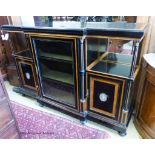 A late Victorian amboyna, banded ebonised break front side cabinet. W-162, D-42, H-107cm.