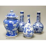 A pair of Chinese blue and white 'dragon' bottle vases, a prunus jar and cover, all late 19th