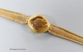 A lady's yellow metal (stamped 585) wrist watch case and strap (no movement), gross 14.6 grams.
