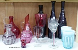 A pair of amethyst glass decanters, cranberry glass and mixed 19th and 20th century coloured