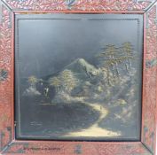 A Japanese lacquer landscape panel, in red lacquered frame, 59 x 59cm
