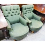 A pair of Victorian style armchairs upholstered in green moire silk.