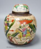 An early 20th century Chinese famille rose crackle glaze jar and cover, 20cm high