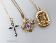 A 9ct gold locket on a 9k chain, a 9k sapphire and diamond set cross pendant and a 9ct amethyst