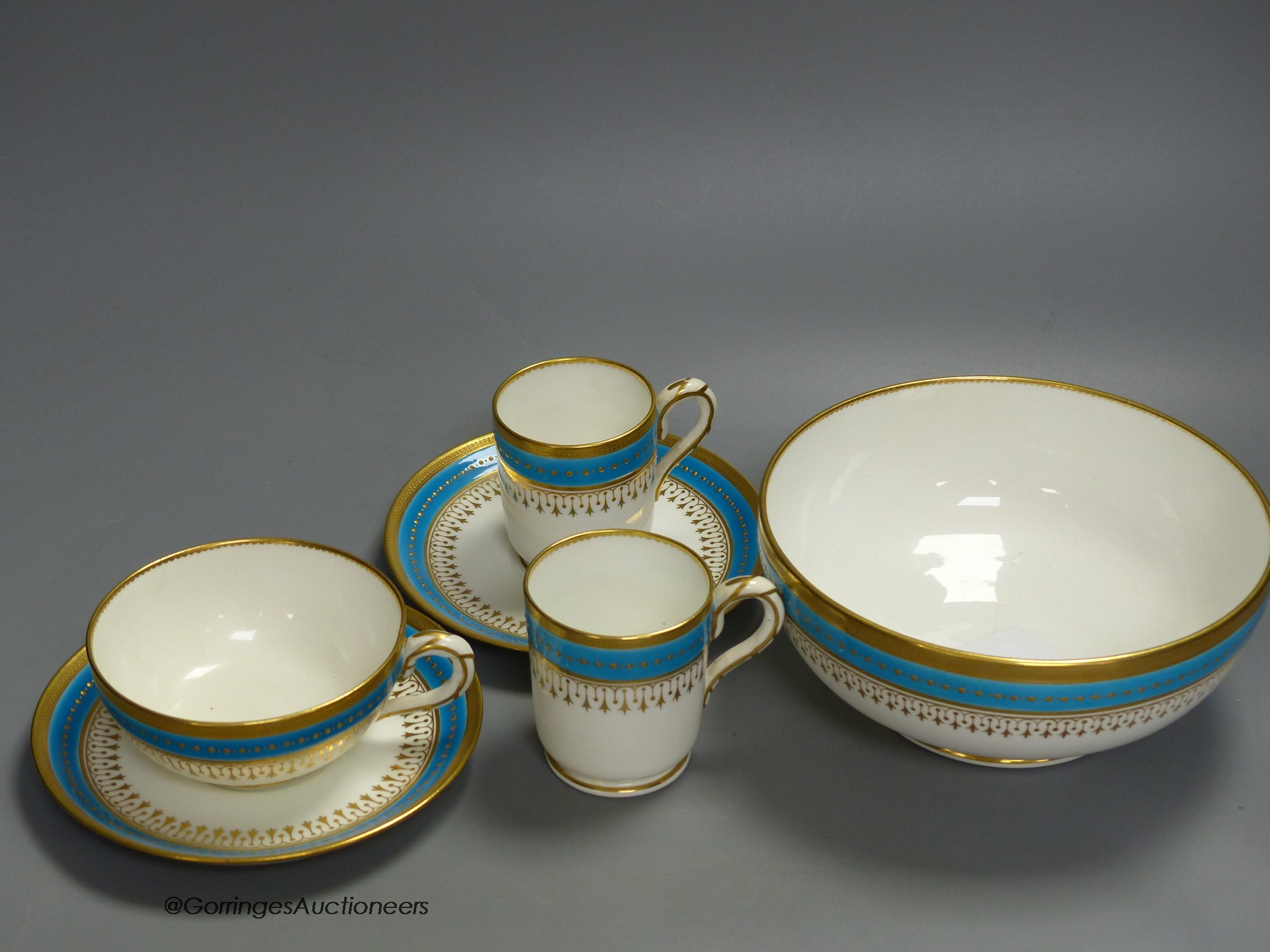 A Minton coffee cup, teacup and saucer with turquoise and gold jewelled band under a gold acid - Image 2 of 3