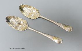 A pair of 18th century silver 'berry' spoons by Ebenezer Coker (marks rubbed and pinched), 19.8cm,