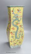 A Chinese yellow ground 'dragon' square baluster vase, 43.5cm high