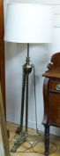 An Edwardian Brass telescopic lamp standard.