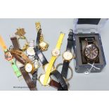 A small collection of mainly modern wrist watches including Armani Exchange.