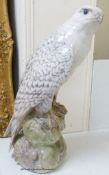 A Royal Copenhagen figure of an Icelandic Gyr falcon, model number 1661, 40 cm high