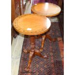 A pair of George III style painted satinwood and mahogany tripod wine tables. D-40, H-63cm.