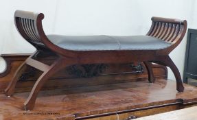 A reproduction mahogany window seat. W-138, D-36, H-58cm.