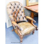 Victorian mahogany spoon back open armchair upholstered in button brown leather. W-64, H-90cm.