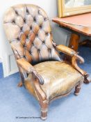 Victorian mahogany spoon back open armchair upholstered in button brown leather. W-64, H-90cm.