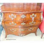 A 19th century Dutch gilt metal mounted mahogany bombe commode. W-110, D-55, H-83cm.